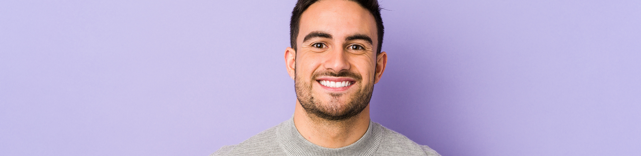 Man smiling after cosmetic dental bonding in Bullard