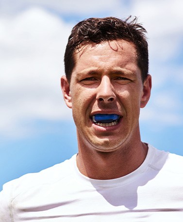 Man wears mouthguard