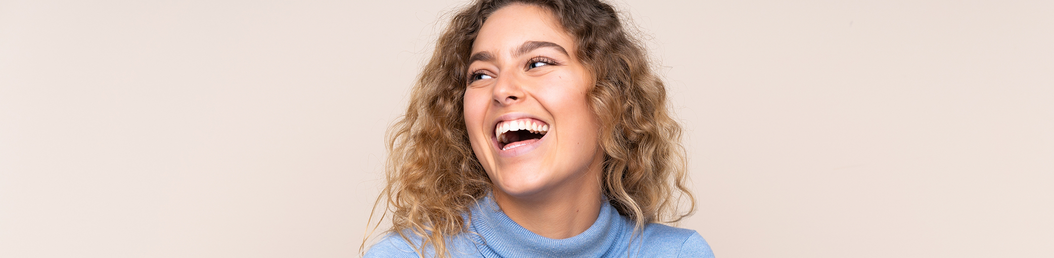 Young woman smiling with flawless teeth after cosmetic dentistry in Bullard