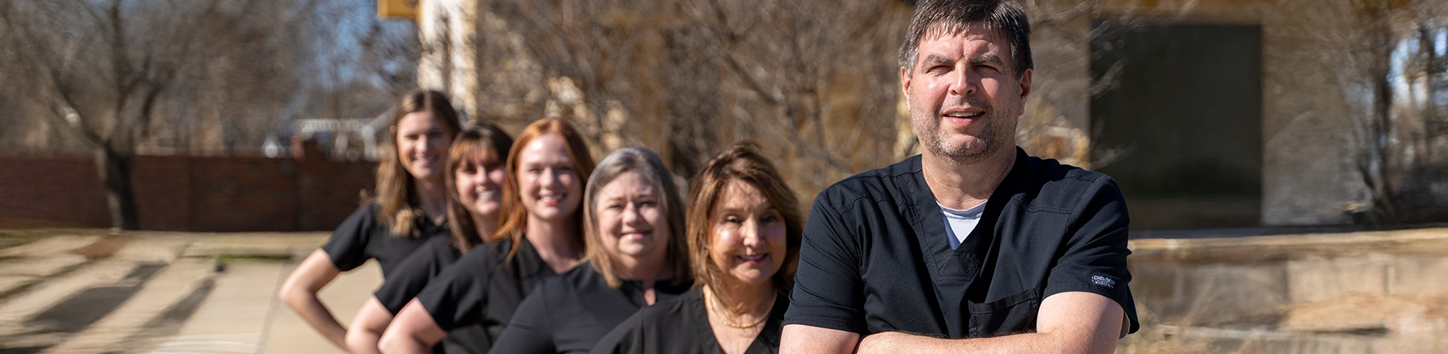 Doctor Tad Morgan with his Bullard dental team members