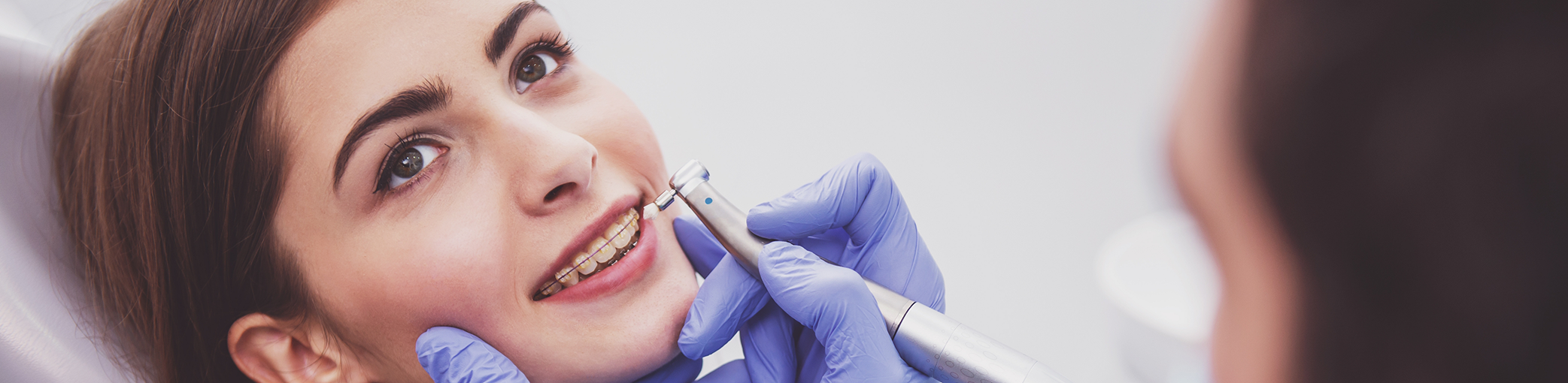 Woman getting a dental cleaning