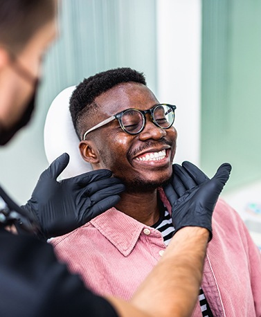 Man smiling in the dental chair